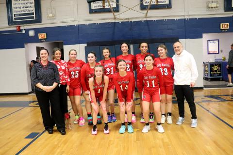 The Hilliard Middle School varsity girls join together with their coaches after winning the school’s fourth county championship in a row. View more photos on page 11. Photo by Amanda Bishop