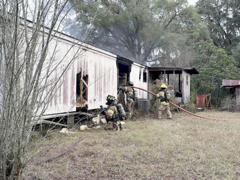Firefighters extinguish the blaze at 28247 Pike Road, Hilliard Dec. 5. Photo courtesy of Nassau County Fire Rescue Professionals Local 3101