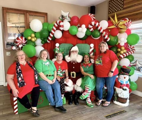 Children shared their wish lists with Santa Claus and received stockings filled with treats. Submitted