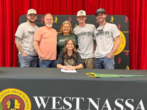 West Nassau High School senior Lauren Rosepiler signs with Florida Gateway College Dec. 17. 