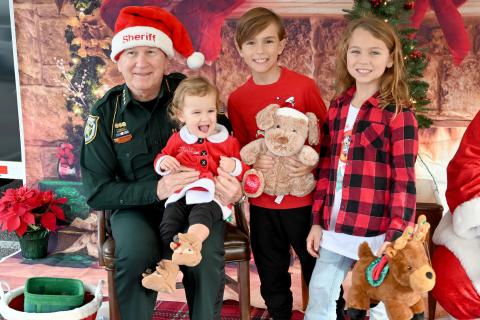 Children meet Santa, Mrs. Claus and Sheriff Bill Leeper in Yulee Dec. 17  during the Santa with a Badge event. Submitted