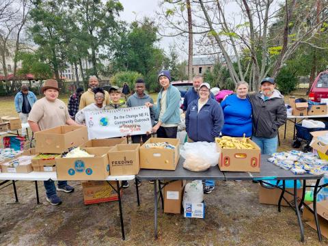 Scouts from Callahan Boy Scout Troop 351 assist with Be the Change Northeast Florida’s community outreach over Christmas break. 