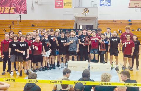 The West Nassau Warrior weightlifting team stand together after winning both Olympic and Traditional Class 1A Region 3 District 5 championships April 7. A total of eight Warriors claimed gold for their weight classes and three Hilliard Middle-Senior High School students claimed gold in both Traditional and Olympic categories.