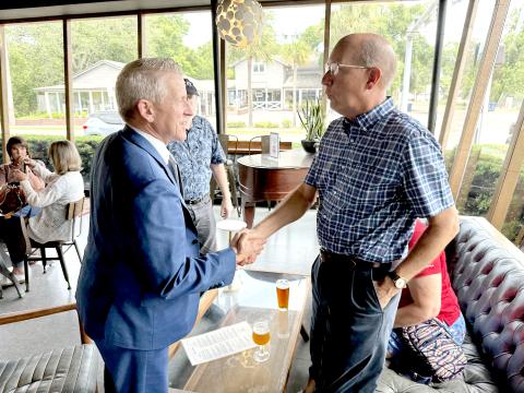 Former Florida House Speaker Paul Renner greets Nassau residents at Mocama Friday. He is one of several Republican candidates for governor. Photo by Nick Blank 