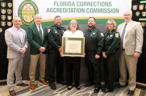 Sheriff Bill Leeper and Nassau County Sheriff Office representatives receive the designation.