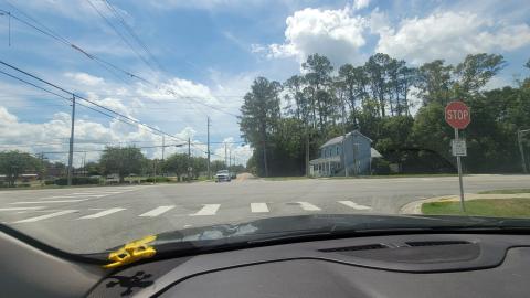 The former caution light at Mickler Street and U.S. 301 in Callahan is gone. It was removed June 17 after it was damaged. It previously aided motorists coming from the west, alerting them that they were entering a small town with reduced speeds and cross traffic. Photo by Amanda Bishop