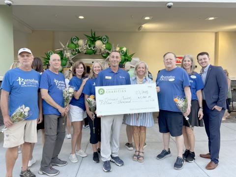 Barnabas Center accepts a $15,000 donation from Publix Super Markets Charities in celebration of the grand opening of the new Fernandina Beach store. Submitted