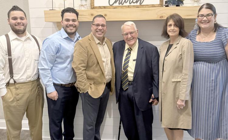 Rev. Tito Miranda, third from left, and his wife, Rev. Gisela Miranda at far right, are the newly appointed pastors of The Anchor Church Español. They are joined by their sons, Alex and Andy Miranda, as well as The Anchor Church Pastor Dwight Allen and his wife, Bonnie Allen. Submitted