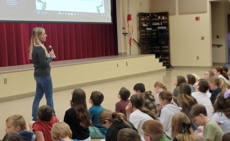 Author Heather Macht speaks to fourth grade students at Callahan Intermediate School. Photos by Amanda Bishop
