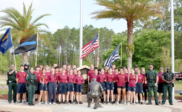 Deputies with the Nassau County Sheriff’s Office join West Nassau High School Air Force JROTC cadets for the annual Law Enforcement Torch Run in support of Special Olympics Florida.