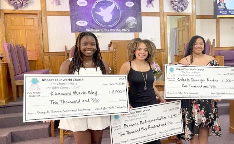 Khamani Way, Breanna Rodriguez-Rollins and Celeste Barket receive their scholarships.