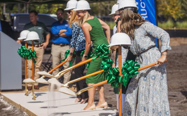 Cornerstone Classical Academy officials are joined by leadership from Auld & White Constructors, Rowe Architects and Rayonier for the school's groundbreaking in Wildlight July 23. Submitted