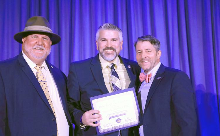 Nassau County Clerk of the Circuit Court and Comptroller Mitch Keiter, center, receives his certificate of completion. Submitted