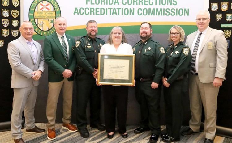 Sheriff Bill Leeper and Nassau County Sheriff Office representatives receive the designation.