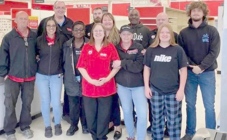 Callahan Winn-Dixie employees join together for a photo as the store closes its doors Sunday morning. The conversion to an Aldi should be complete by summer 2027. Submitted